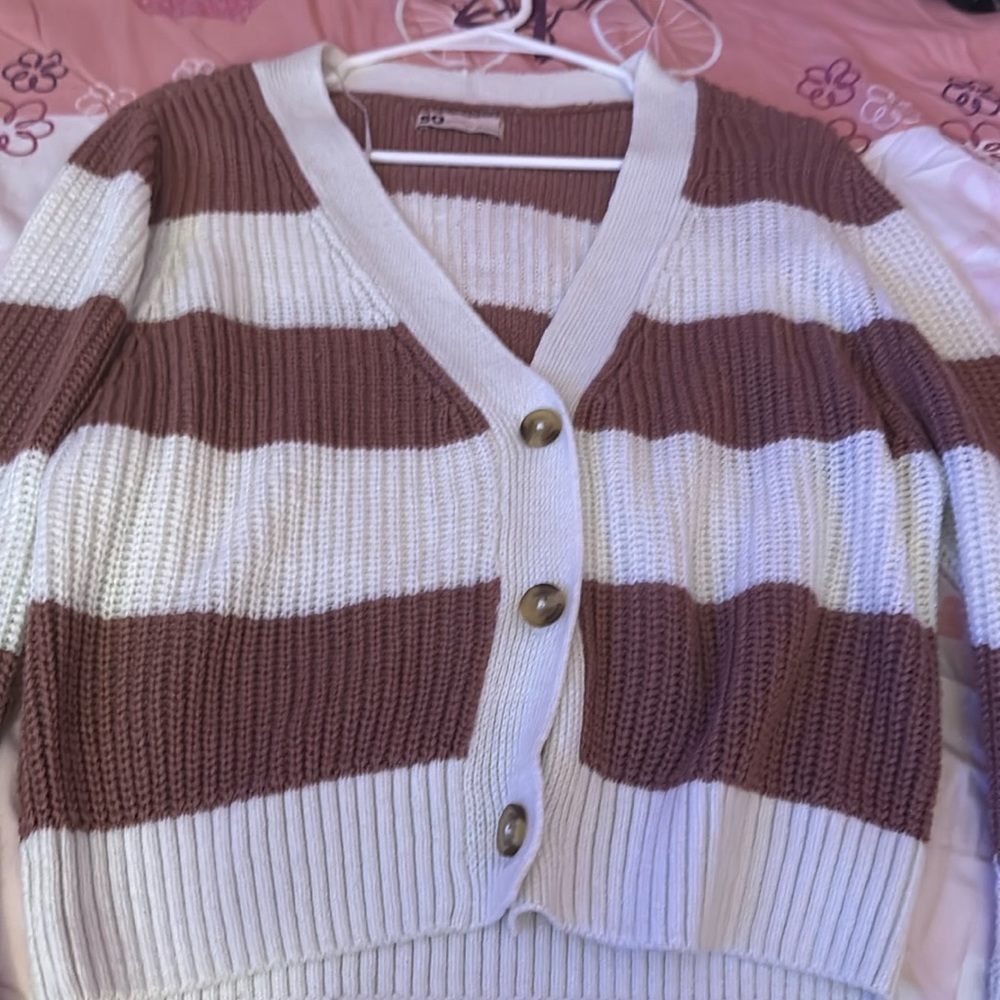 a Pink sweater